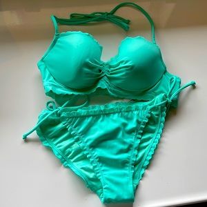 Victoria’s Secret string bikini bottoms and clip back.